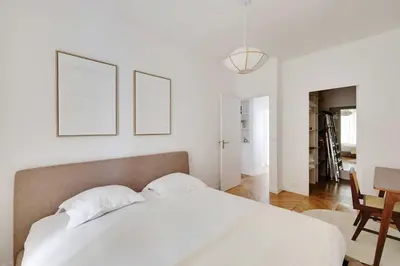 Un ou plusieurs lits dans un hébergement de l'établissement Modern flat - 6P- Voltaire