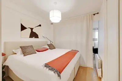 Un ou plusieurs lits dans un hébergement de l'établissement Beautiful Apartment 2BR 6P – Eiffel Tower