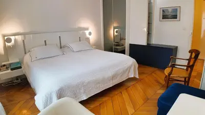Un ou plusieurs lits dans un hébergement de l'établissement Parisian Elegance in Ranelagh