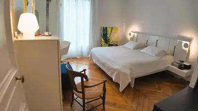 Un ou plusieurs lits dans un hébergement de l'établissement Parisian Elegance in Ranelagh