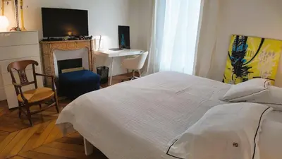 Un ou plusieurs lits dans un hébergement de l'établissement Parisian Elegance in Ranelagh