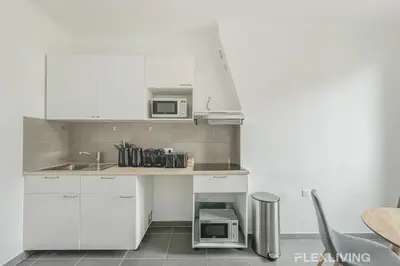 Cuisine ou kitchenette dans l'établissement Chambre cosy et charmante à Alésia Paris 14e