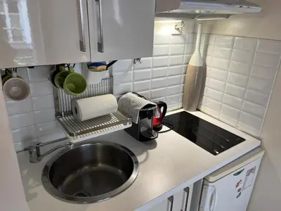 Cuisine ou kitchenette dans l'établissement Cosy studio Montorgueil paris centre