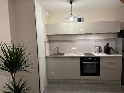 Cuisine ou kitchenette dans l'établissement Eiffel Horizon Proche Paris Métro 14