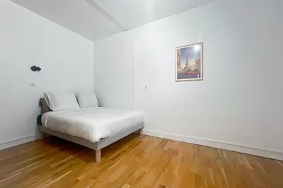 Un ou plusieurs lits dans un hébergement de l'établissement Charming apartment near Bastille