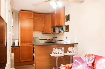 Cuisine ou kitchenette dans l'établissement Apartment in the heart of Paris quiet and easy