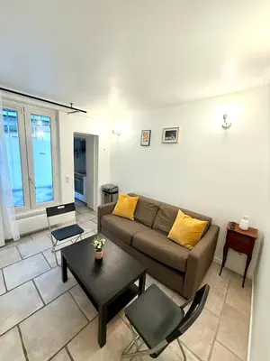 Coin salon dans l'établissement Appartement Bridaine Batignolles Paris