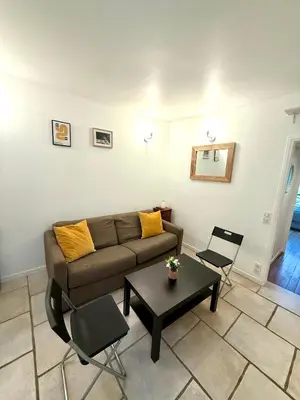 Coin salon dans l'établissement Appartement Bridaine Batignolles Paris