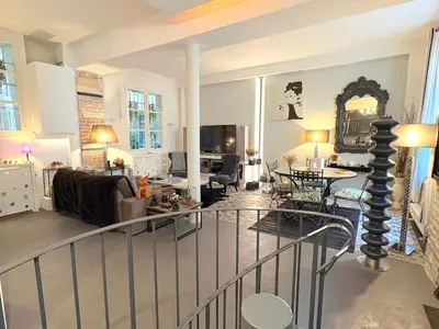 Coin salon dans l'établissement Le Loft Villehardouin