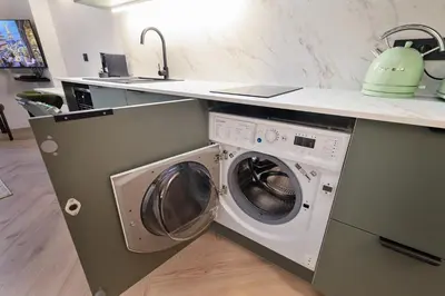Cuisine ou kitchenette dans l'établissement Parisian Gem with Stunning View
