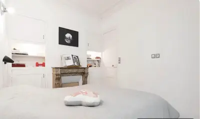 Un ou plusieurs lits dans un hébergement de l'établissement Stylish Montmartre Apartment