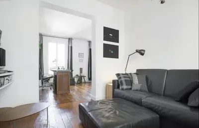 Coin salon dans l'établissement Stylish Montmartre Apartment