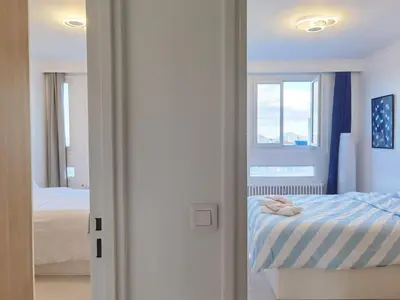 Un ou plusieurs lits dans un hébergement de l'établissement Modern 2-Bed Apt 80m2 with Elevator FREE Parking N19-25