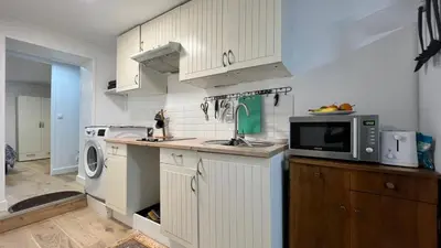 Cuisine ou kitchenette dans l'établissement Nation FS Antoine