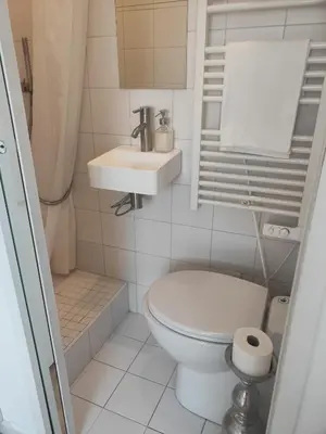 Salle de bains dans l'établissement Charmant Nid Vue tout Paris Neuf Calme Clair Ascenseur AC
