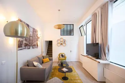 Télévision ou salle de divertissement dans l'établissement Lemoine Reaumur 2 Cosy Appartement 6P 2BR