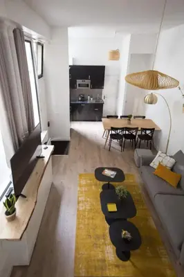 Télévision ou salle de divertissement dans l'établissement Lemoine Reaumur 2 Cosy Appartement 6P 2BR