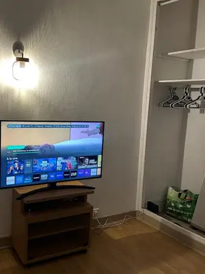 Télévision ou salle de divertissement dans l'établissement Appartement Lumineux, à 5 minutes de Paris