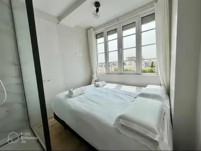 Un ou plusieurs lits dans un hébergement de l'établissement Exceptional apartment near Parc des Princes