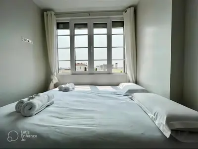 Un ou plusieurs lits dans un hébergement de l'établissement Exceptional apartment near Parc des Princes