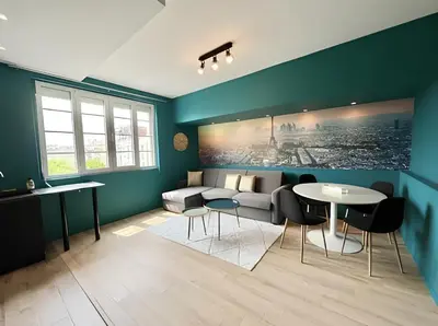 Coin salon dans l'établissement Exceptional apartment near Parc des Princes