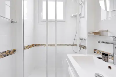 Salle de bains dans l'établissement Duplex Raffine a deux pas de la Tour Eiffel - Avec A-C