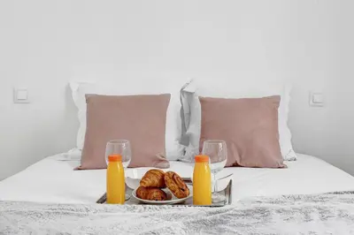 Un ou plusieurs lits dans un hébergement de l'établissement 521 Suite Médéric - Modern apartment Paris 17