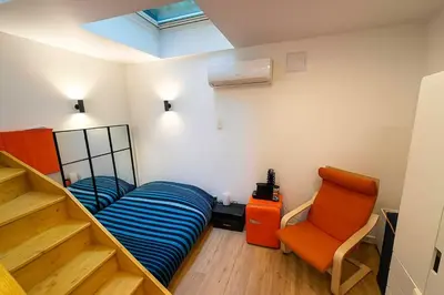 Coin salon dans l'établissement Superbe appartement sur jardin- proche de paris