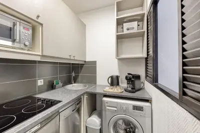 Cuisine ou kitchenette dans l'établissement Le Rustique - Porte de Versailles Apartment