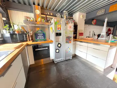 Cuisine ou kitchenette dans l'établissement Villa Georges