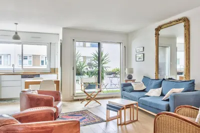 Coin salon dans l'établissement Appartement Iris avec sa terrasse - Welkeys