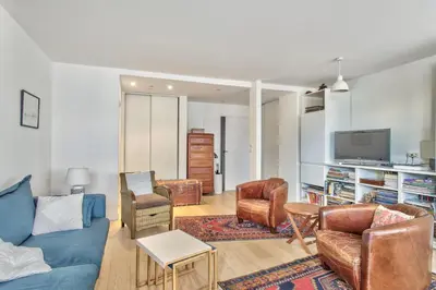 Coin salon dans l'établissement Appartement Iris avec sa terrasse - Welkeys