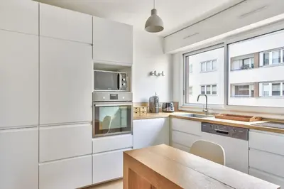 Cuisine ou kitchenette dans l'établissement Appartement Iris avec sa terrasse - Welkeys