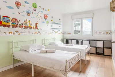 Un ou plusieurs lits dans un hébergement de l'établissement Appartement Fleury - Welkeys