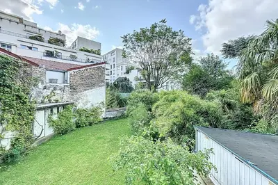 Jardin de l'établissement Cosy apartment near Roland-Garros