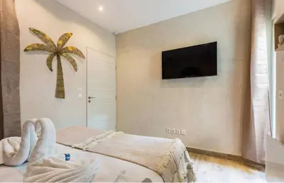 Un ou plusieurs lits dans un hébergement de l'établissement Superbe appartement proche de Nation