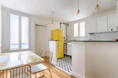 Cuisine ou kitchenette dans l'établissement Central Paris l Mid-Term l Marais in 10min