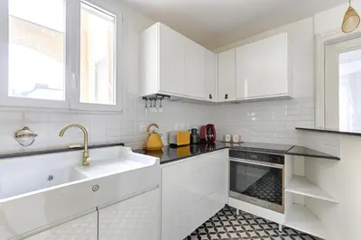 Cuisine ou kitchenette dans l'établissement Central Paris l Mid-Term l Marais in 10min