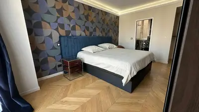 Un ou plusieurs lits dans un hébergement de l'établissement Luxury Apartment – 3 Bedrooms / Arc de Triomphe