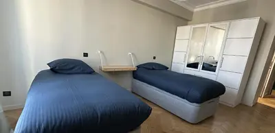 Un ou plusieurs lits dans un hébergement de l'établissement Luxury Apartment – 3 Bedrooms / Arc de Triomphe