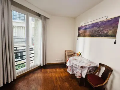 Un ou plusieurs lits dans un hébergement de l'établissement 2-bedrooms apart near Parc des Princes