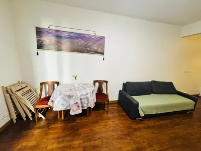 Coin salon dans l'établissement 2-bedrooms apart near Parc des Princes
