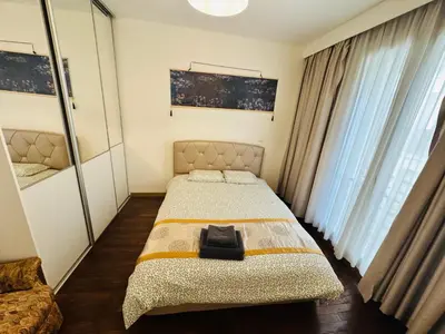 Un ou plusieurs lits dans un hébergement de l'établissement 2-bedrooms apart near Parc des Princes