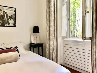 Un ou plusieurs lits dans un hébergement de l'établissement Joli 2 pièces Jussieu Paris 5