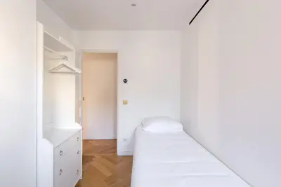 Un ou plusieurs lits dans un hébergement de l'établissement Le Marais - Iconic Penthouse with Balcony