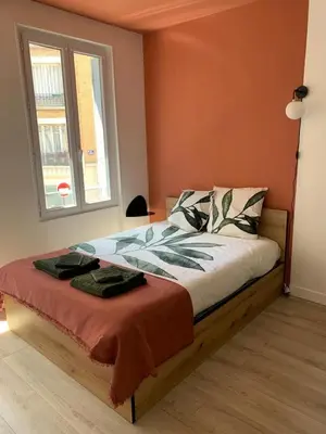 Un ou plusieurs lits dans un hébergement de l'établissement Le studio parisien