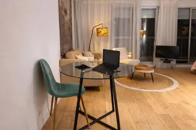 Coin salon dans l'établissement Grand Studio 50 m2 Balcon Porte de Versailles