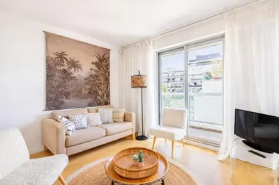 Coin salon dans l'établissement Grand Studio 50 m2 Balcon Porte de Versailles