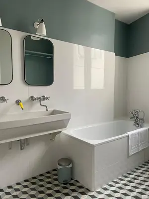 Salle de bains dans l'établissement L'Appartement Corentin