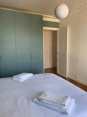 Un ou plusieurs lits dans un hébergement de l'établissement L'Appartement Corentin